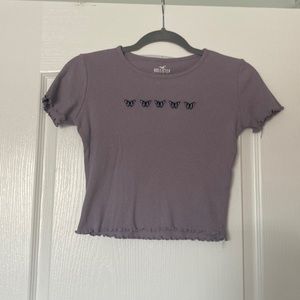 Purple crop top with 5 blue butterfly’s